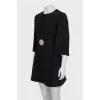 Black dress with gold logo