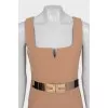 Beige dress with golden decor
