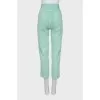 Green tapered fit jeans