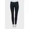 Skinny jeans decorated with seams