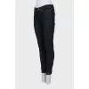 Skinny jeans decorated with seams