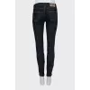 Skinny jeans decorated with seams