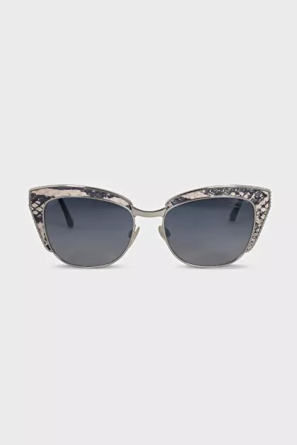 Sunglasses with leather elements