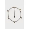 Gold bracelet with round pendants