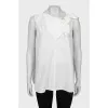 Loose blouse with decorative ties