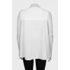 Loose blouse with decorative ties