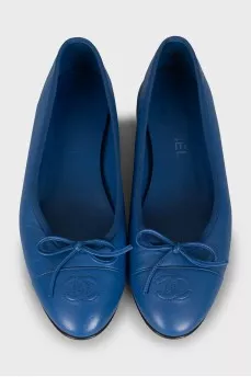 Blue leather ballet flats with logo