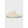 Fur slippers with brand logo