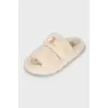 Fur slippers with brand logo