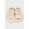 Fur slippers with brand logo