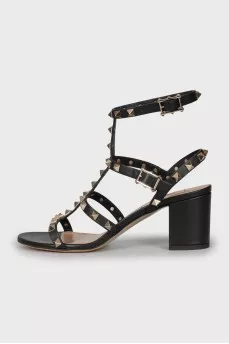 Leather sandals with studded heels