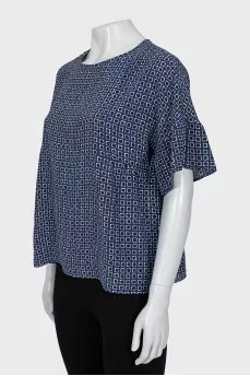 Blue blouse with geometric print