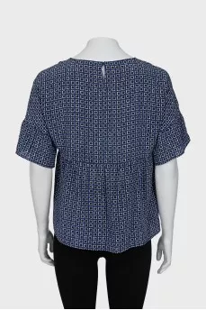 Blue blouse with geometric print