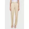 Beige trousers with flared trousers