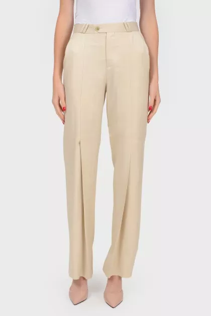 Beige trousers with flared trousers