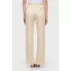 Beige trousers with flared trousers