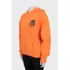 Orange hoodie with print