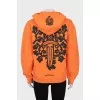 Orange hoodie with print