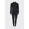 Suit of a cardigan with a zipper and trousers
