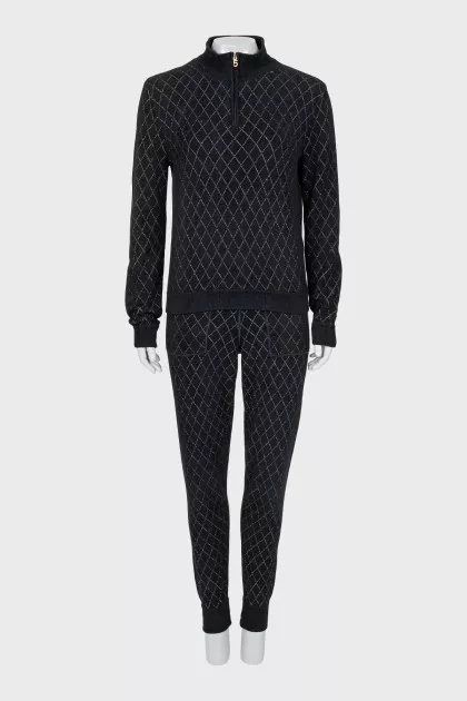 Suit of a cardigan with a zipper and trousers