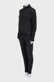 Suit of a cardigan with a zipper and trousers