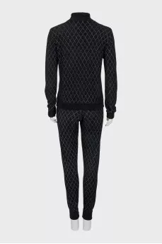 Suit of a cardigan with a zipper and trousers