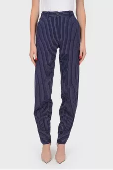 Tapered trousers in white stripes with buttons