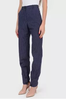Tapered trousers in white stripes with buttons