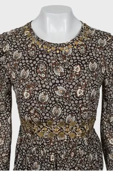 Dress with metallic decor