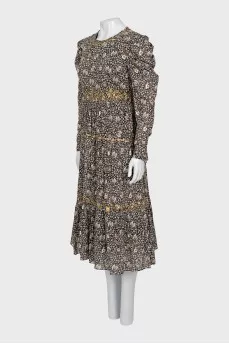 Dress with metallic decor