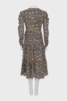 Dress with metallic decor