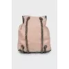 Backpack decorated with chains