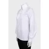 Shirt with branded buttons