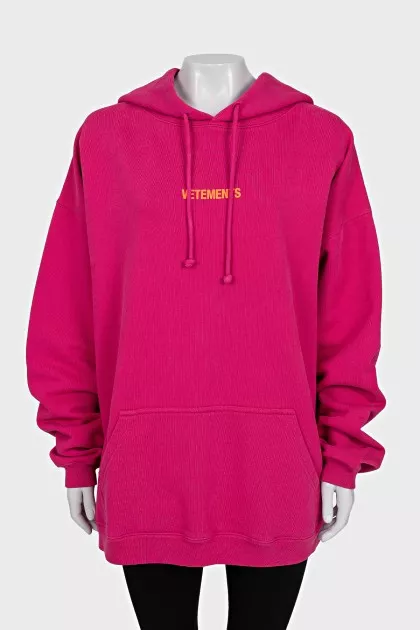 Pink hoodie with brand logo