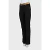 Wool trousers with golden belt