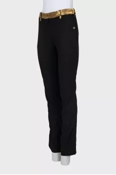 Wool trousers with golden belt