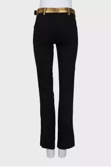 Wool trousers with golden belt