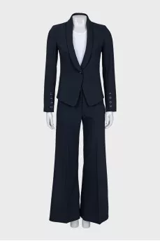 Suit with fitted jacket and wide trousers