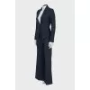 Suit with fitted jacket and wide trousers