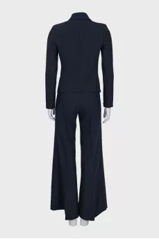 Suit with fitted jacket and wide trousers