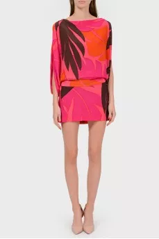 Silk bright dress with a cut on the back