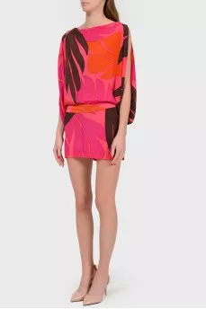 Silk bright dress with a cut on the back