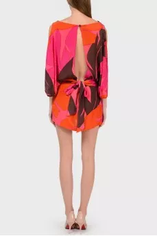 Silk bright dress with a cut on the back