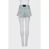 Blue distressed denim shorts