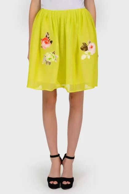 Yellow skirt with floral appliqué