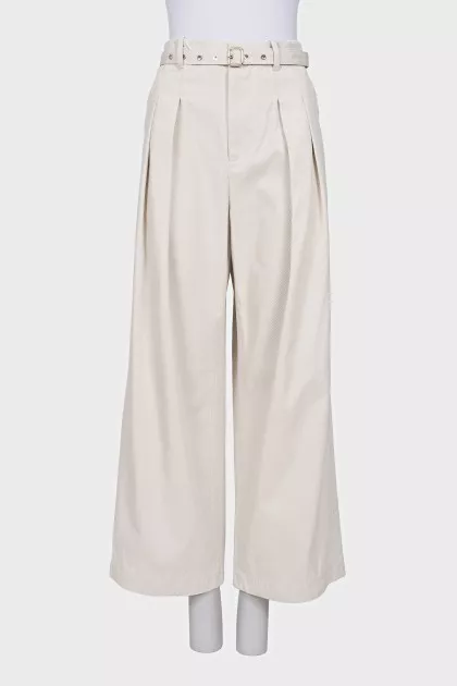 White jeans with belt