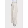 White jeans with belt