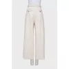 White jeans with belt
