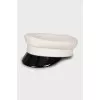 White cap with black visor