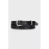 Black leather belt with metal element